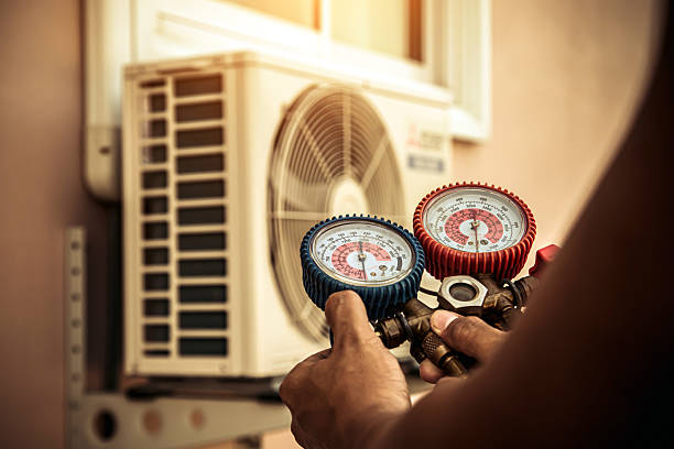 Professional Hvac Maintenance technician working in Española, NM